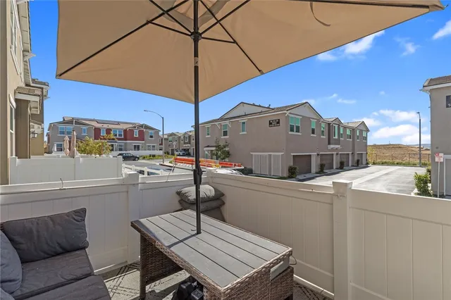 a terrace view with sitting space and garden space