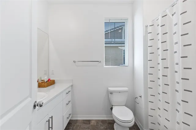 a bathroom with a sink a vanity and mirror
