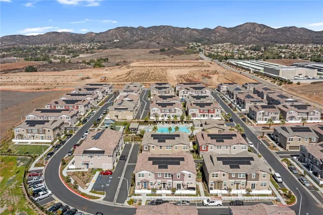an aerial view of a multi story residential apartment building