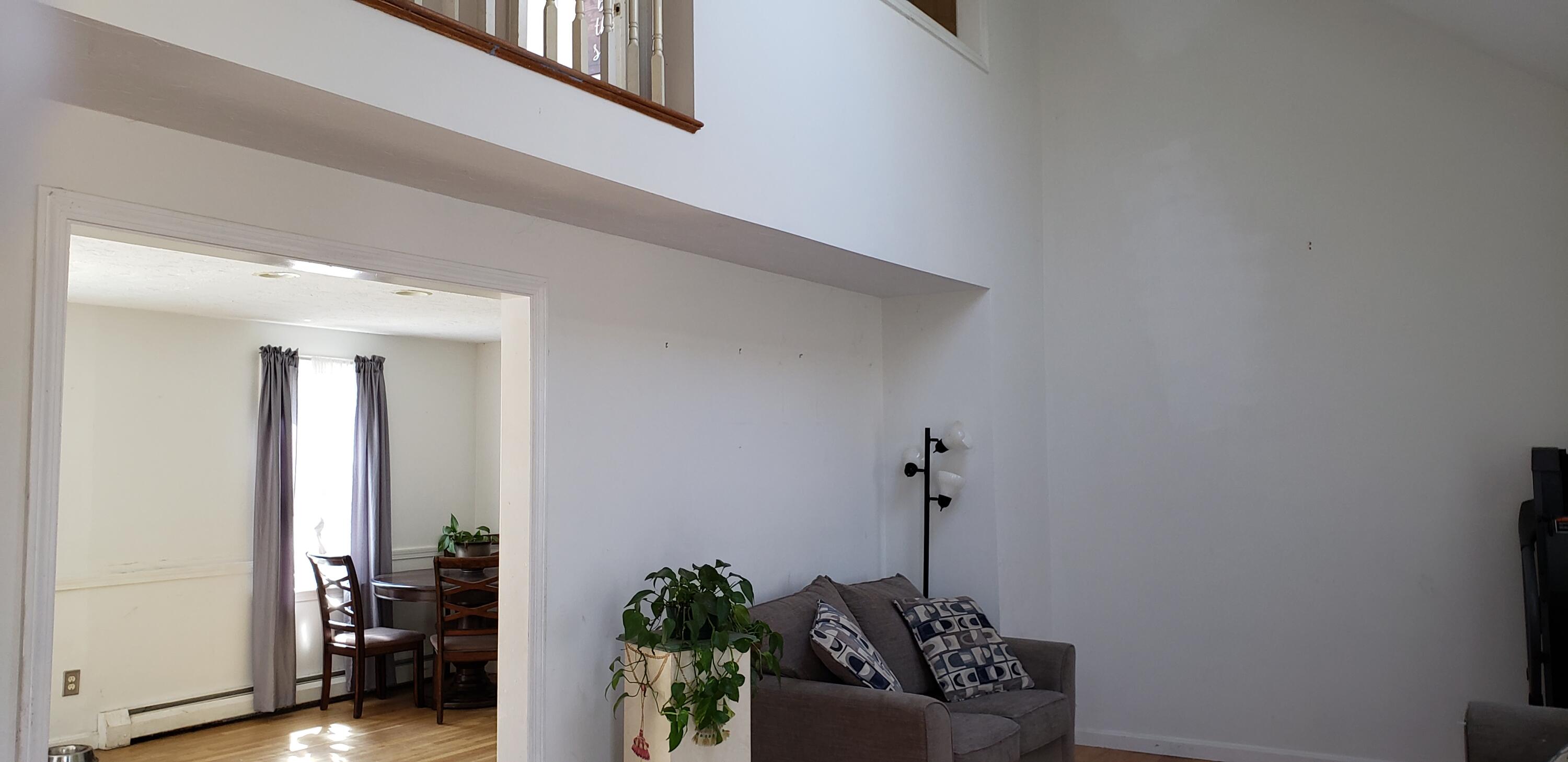 52 Jasper Road Marstons Mills, MA 02648 - Photo 3 of 28 a view of a hallway with potted plants