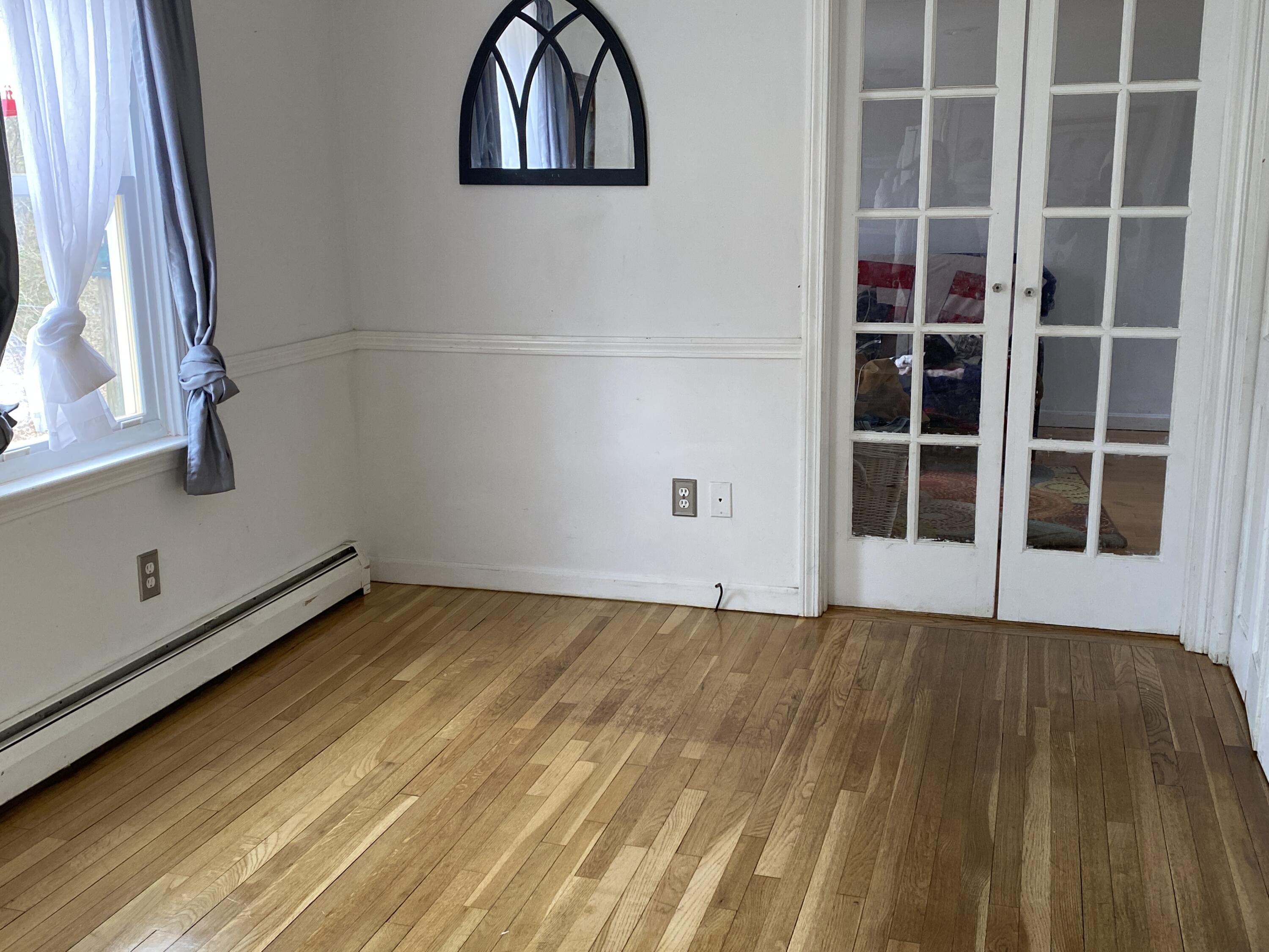 52 Jasper Road Marstons Mills, MA 02648 - Photo 9 of 28 a view of an empty room with a window