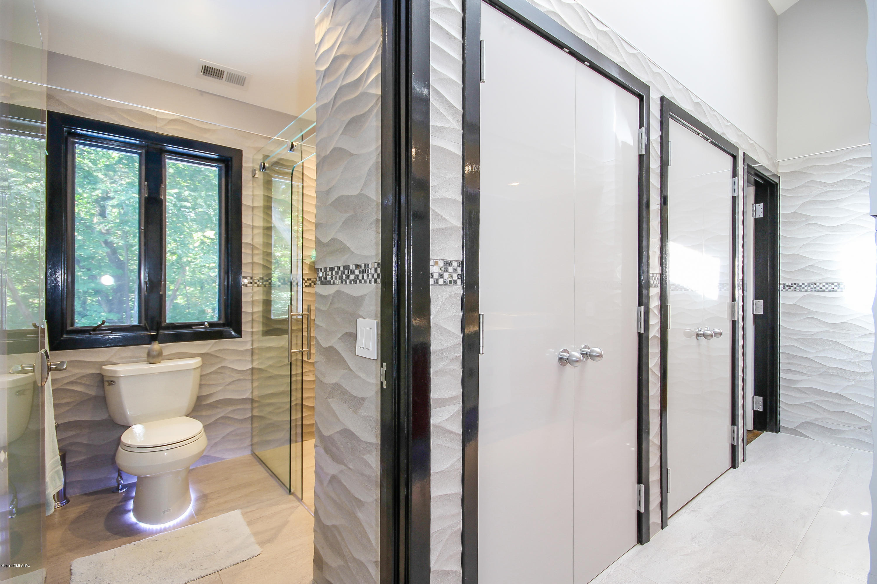 106 Porchuck Road Greenwich, CT 06831 - Photo 18 of 37 a bathroom with a toilet sink and shower