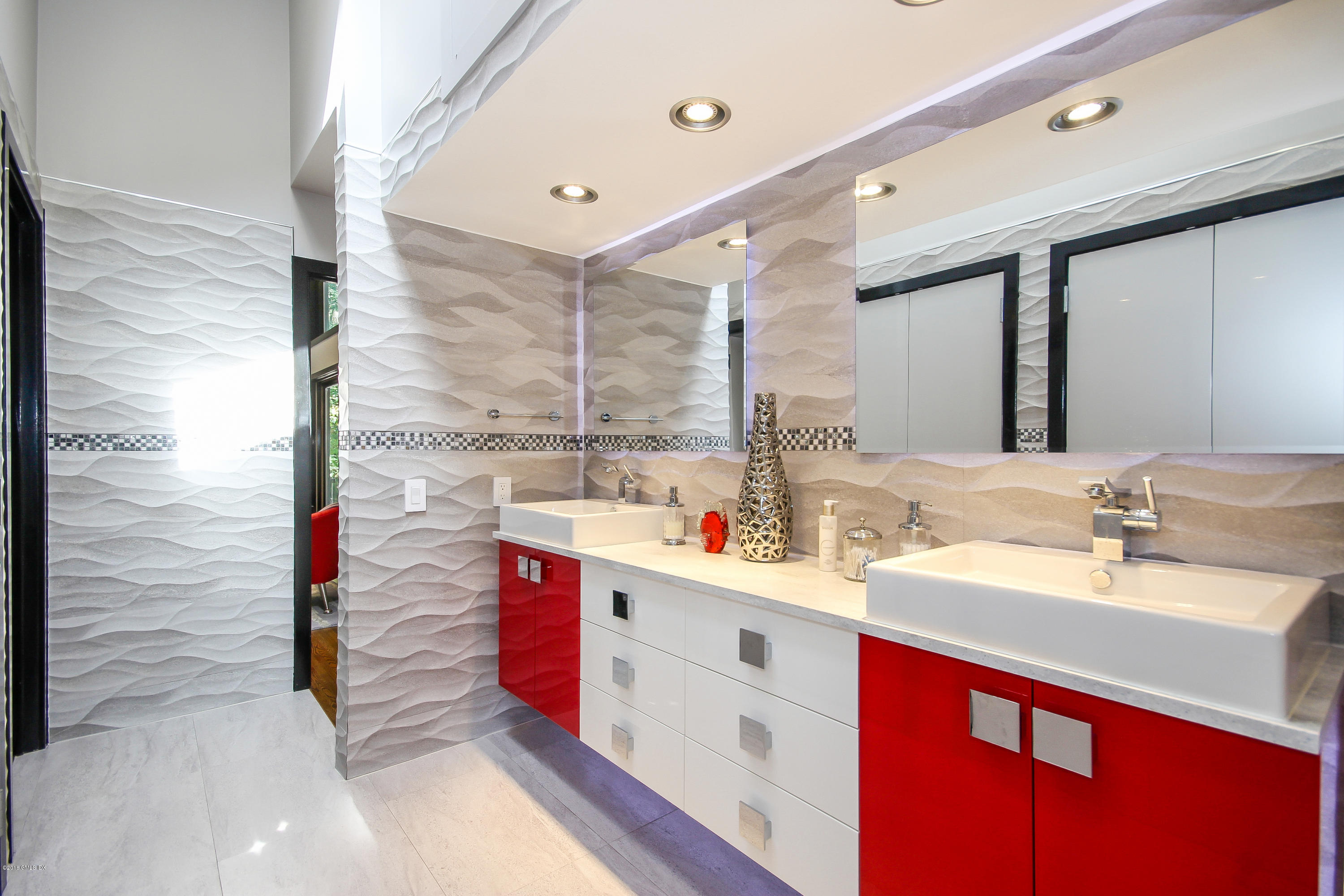 106 Porchuck Road Greenwich, CT 06831 - Photo 19 of 37 a bathroom with a sink vanity mirror and shower