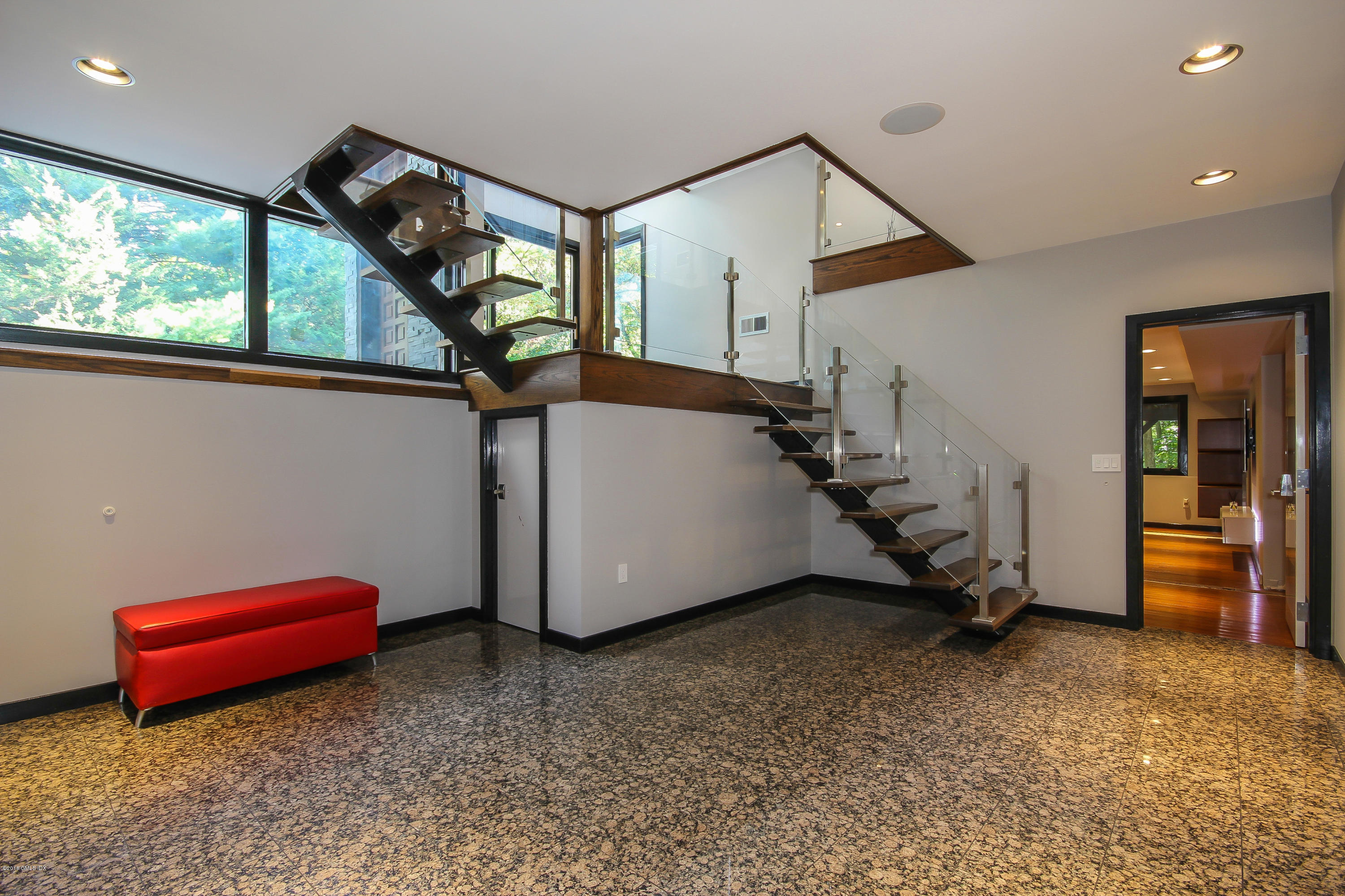 106 Porchuck Road Greenwich, CT 06831 - Photo 25 of 37 a view of a livingroom with furniture and a window