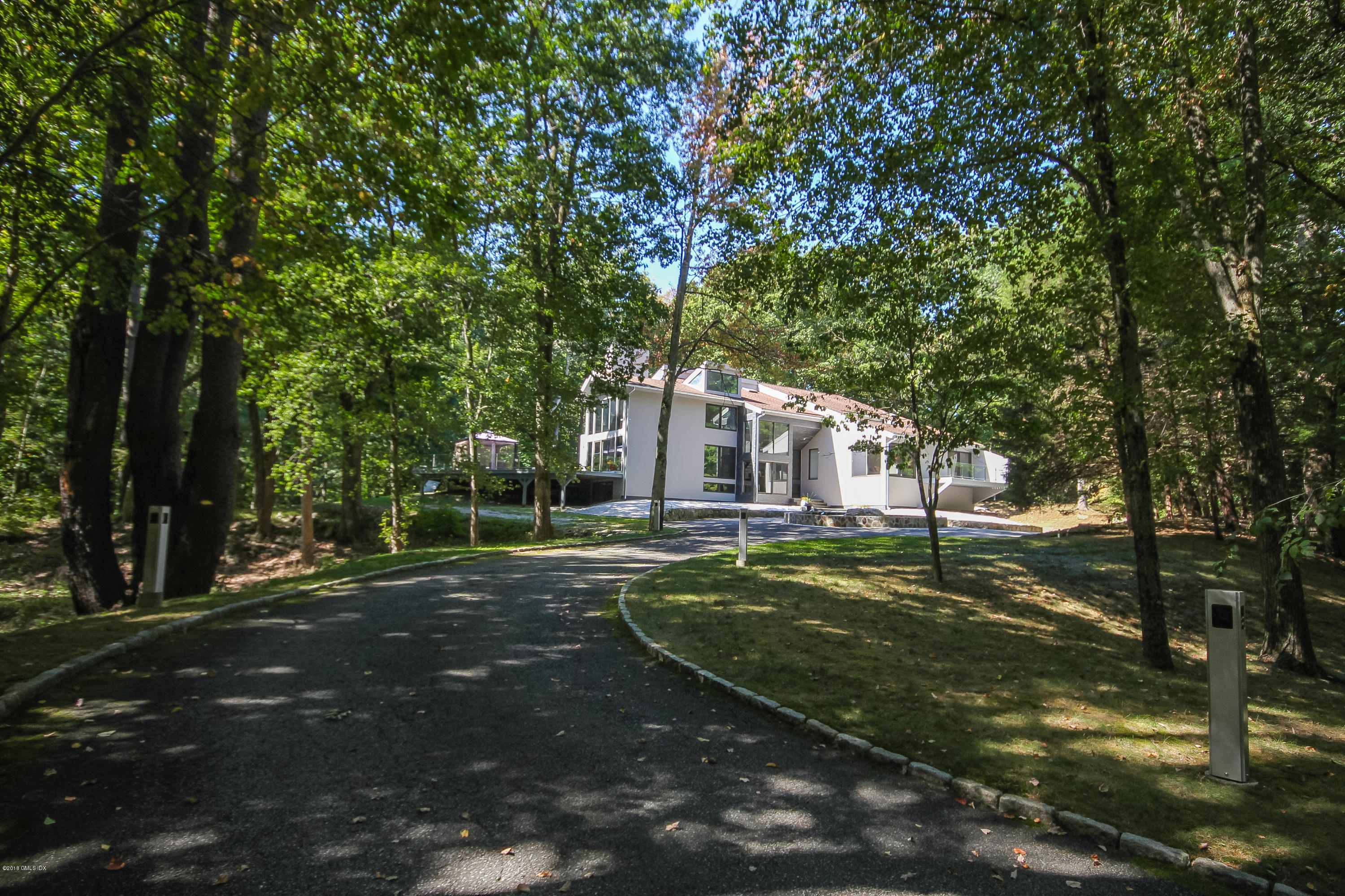 106 Porchuck Road Greenwich, CT 06831 - Photo 33 of 37 a view of a trees in a yard