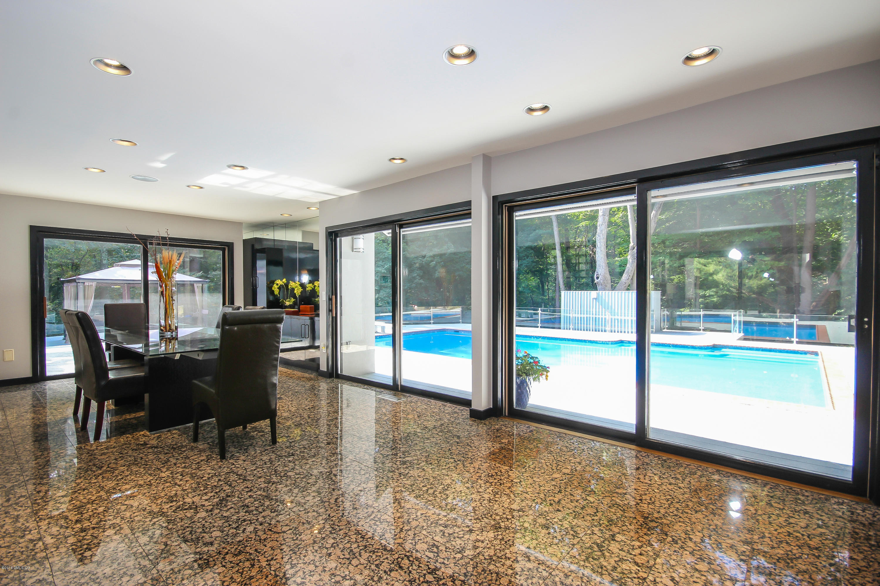 106 Porchuck Road Greenwich, CT 06831 - Photo 10 of 37 a view of a room with furniture window and outside view