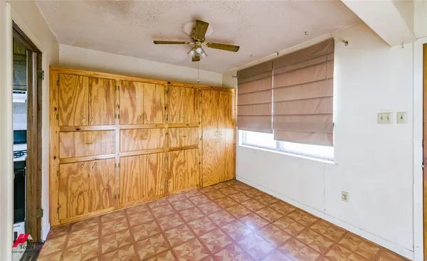 a view of a room with a window