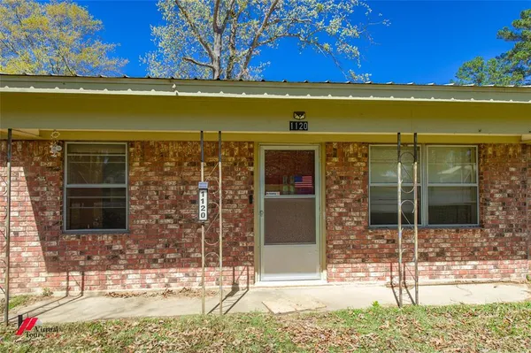 a view of swimming pool with outdoor seating