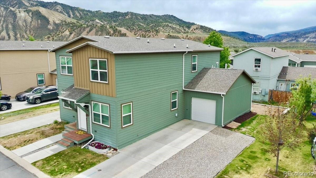 53 Brook Trout Loop Gypsum, CO 81637 - Photo 2 of 38 a front view of a house with a yard
