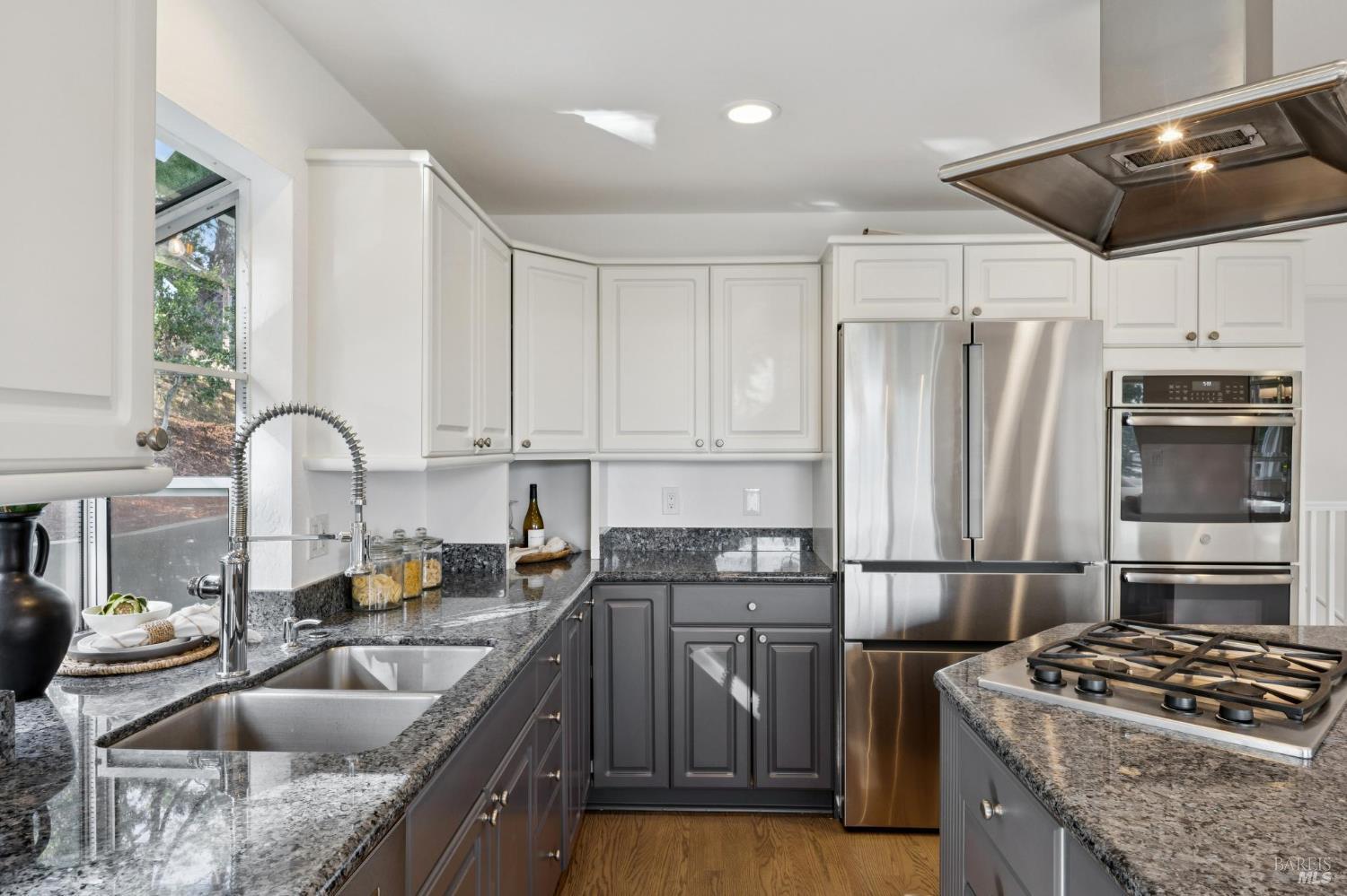 81 Rose Street San Rafael, CA 94901 - Photo 21 of 67 a kitchen with stainless steel appliances granite countertop a sink stove and refrigerator