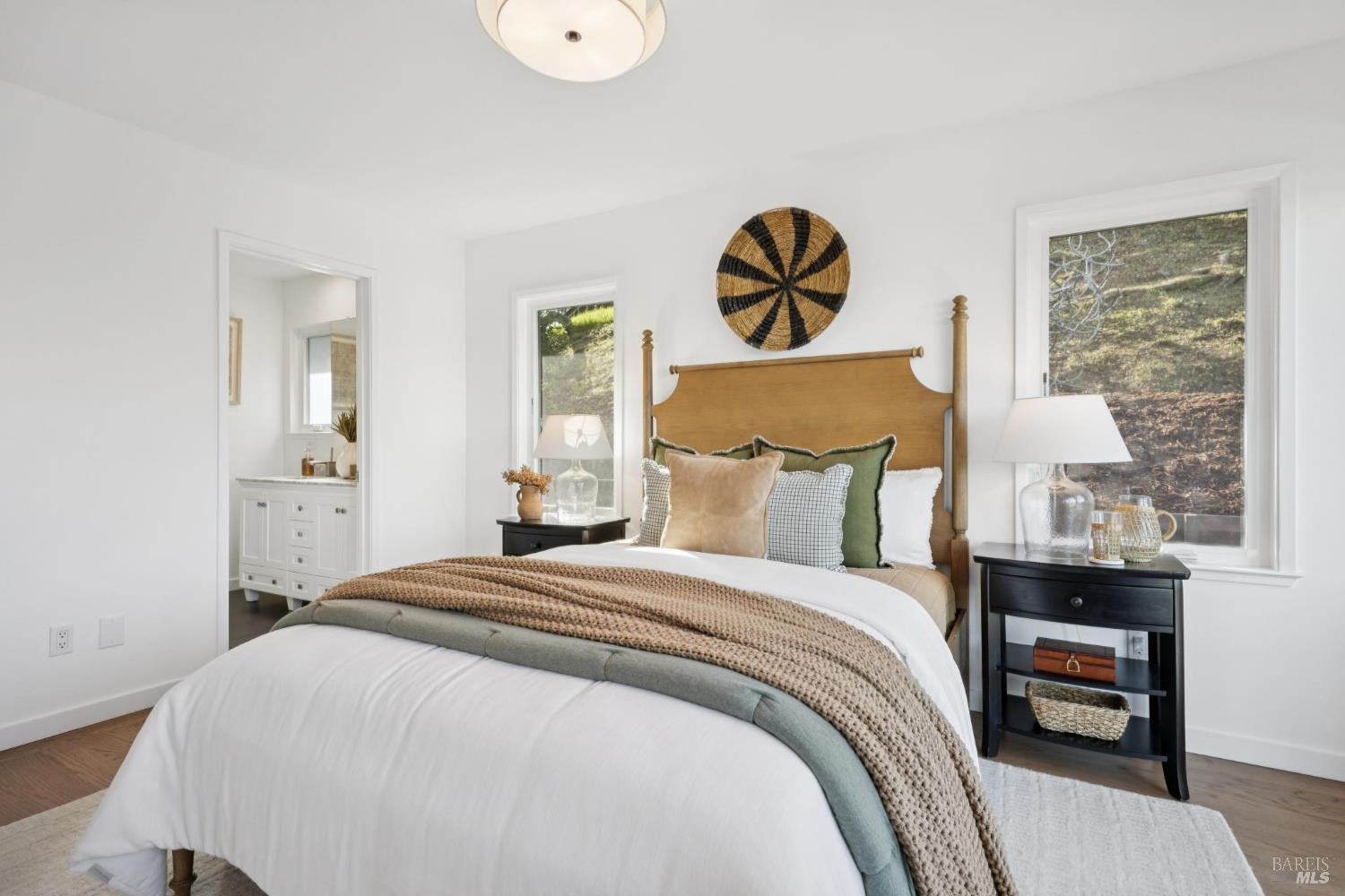 81 Rose Street San Rafael, CA 94901 - Photo 32 of 67 a bedroom with a bed and a painting on the wall