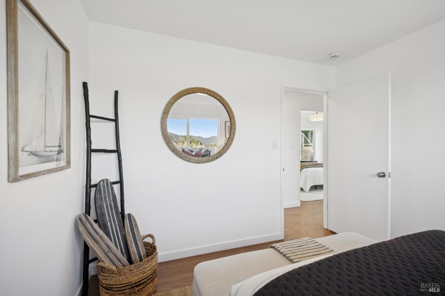 81 Rose Street San Rafael, CA 94901 - Photo 53 of 67 a bedroom with a bed and a chandelier