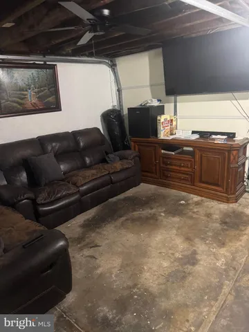 a bathroom with a toilet a sink and a mirror