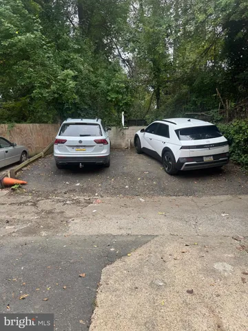 a view of a car parked in a parking lot