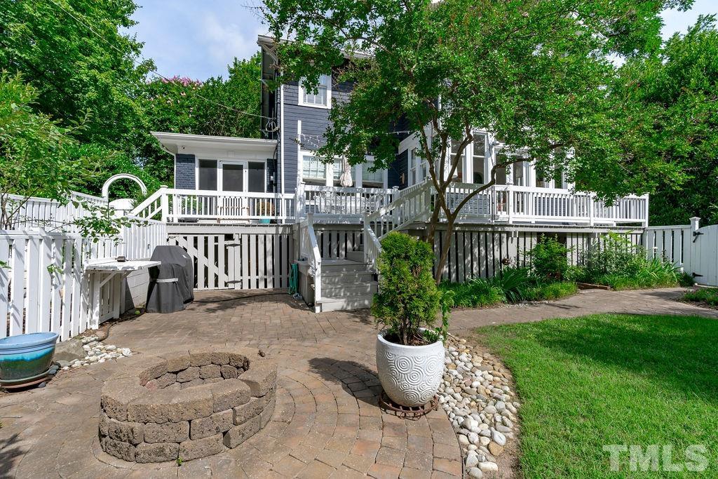 116 Hillcrest Road Raleigh, NC 27605 - Photo 22 of 30 a view of a house with backyard and sitting area