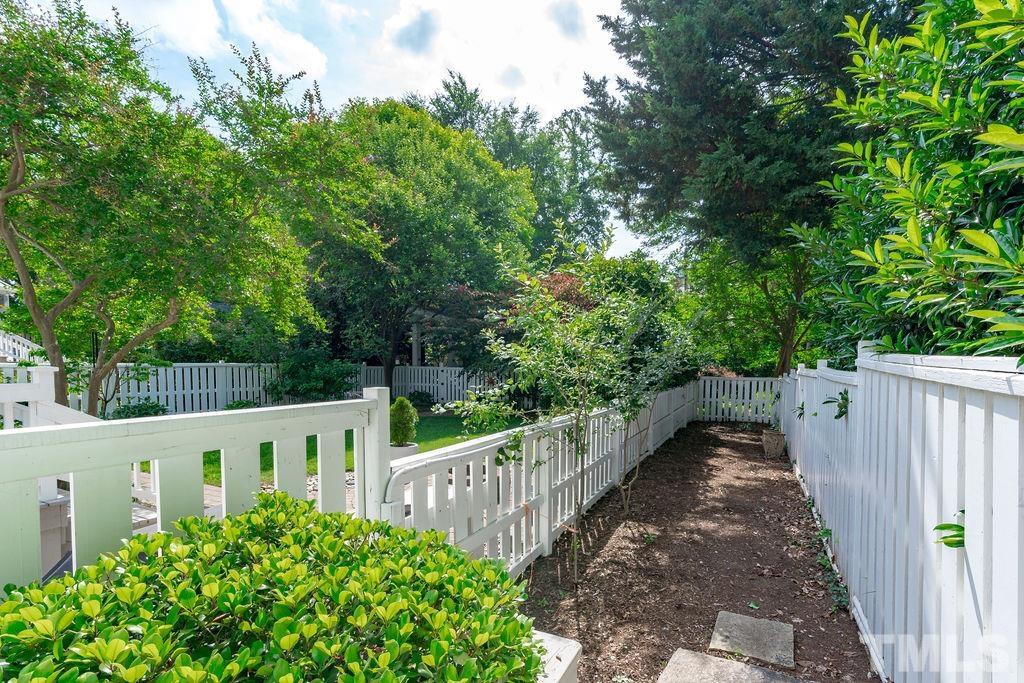 116 Hillcrest Road Raleigh, NC 27605 - Photo 23 of 30 a view of a house with wooden fence