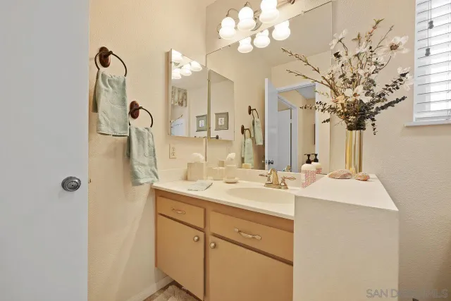 a view of livingroom with furniture and book shelf