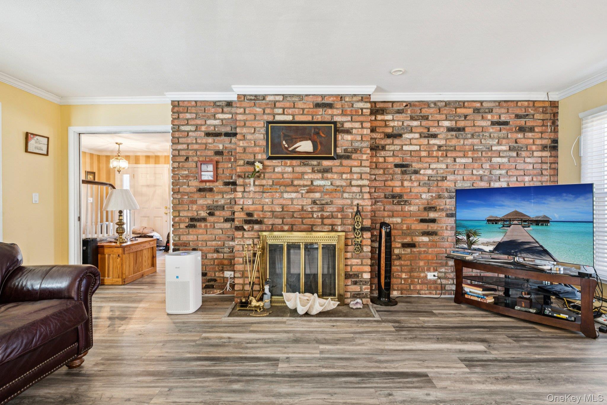 2 3 Pond Road Smithtown, NY 11787 - Photo 6 of 40 Den with Double Sided Wood Burning Fireplace
