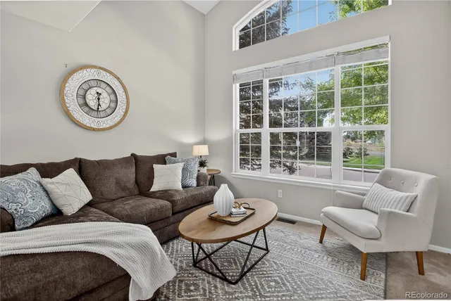 a view of walk in closet with clothes