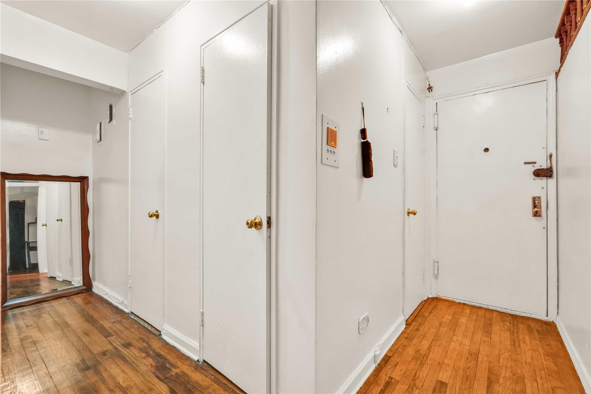 42-25 80th Street, Unit 1F Queens, NY 11373 - Photo 5 of 27 Corridor featuring hardwood / wood-style floors