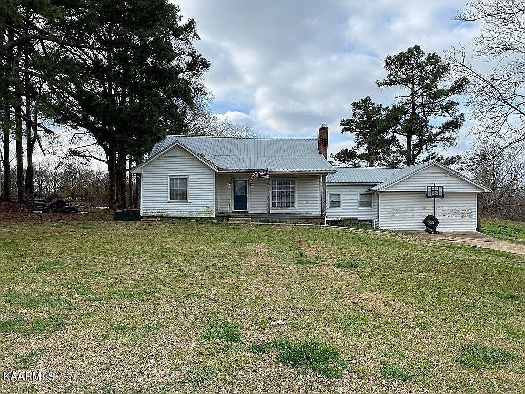 4135 Sidonia Road Sharon, TN 38255 - Photo 1 of 13 a view of a house with a yard
