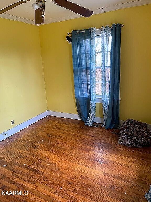 4135 Sidonia Road Sharon, TN 38255 - Photo 7 of 13 a view of a room that has a bed and a window