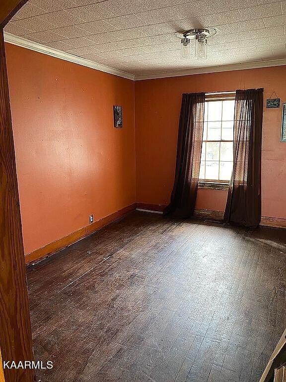 4135 Sidonia Road Sharon, TN 38255 - Photo 8 of 13 an empty room with a window