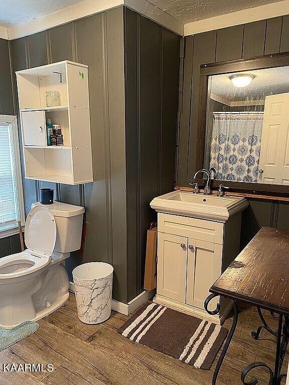 4135 Sidonia Road Sharon, TN 38255 - Photo 10 of 13 a bathroom with a sink toilet and mirror