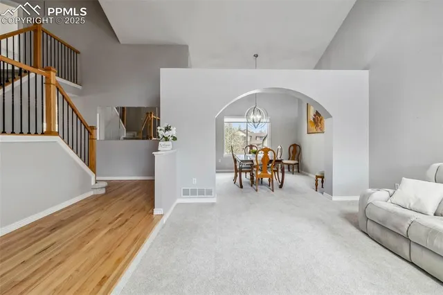 a view of a livingroom with furniture and a fireplace