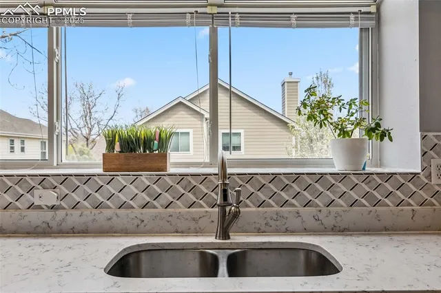 a view of a sink and window
