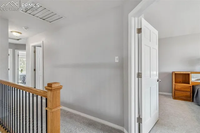 a view of a hallway with elevator