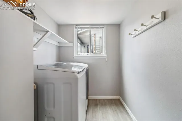 a view of utility room with washer and dryer