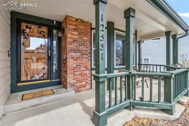 a view of an entryway with a front door