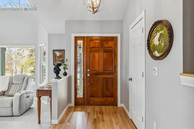 a view of a livingroom with furniture and windows