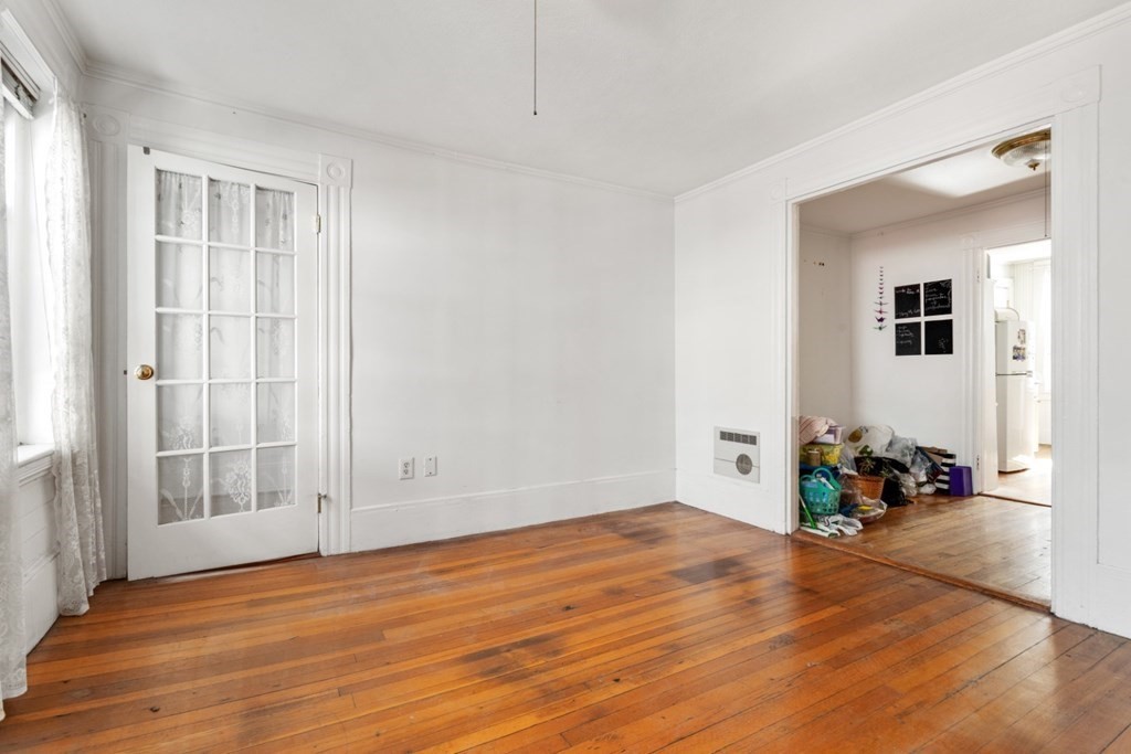 72 North Margin Street Boston, MA 02113 - Photo 21 of 42 a view of a livingroom with wooden floor and a window