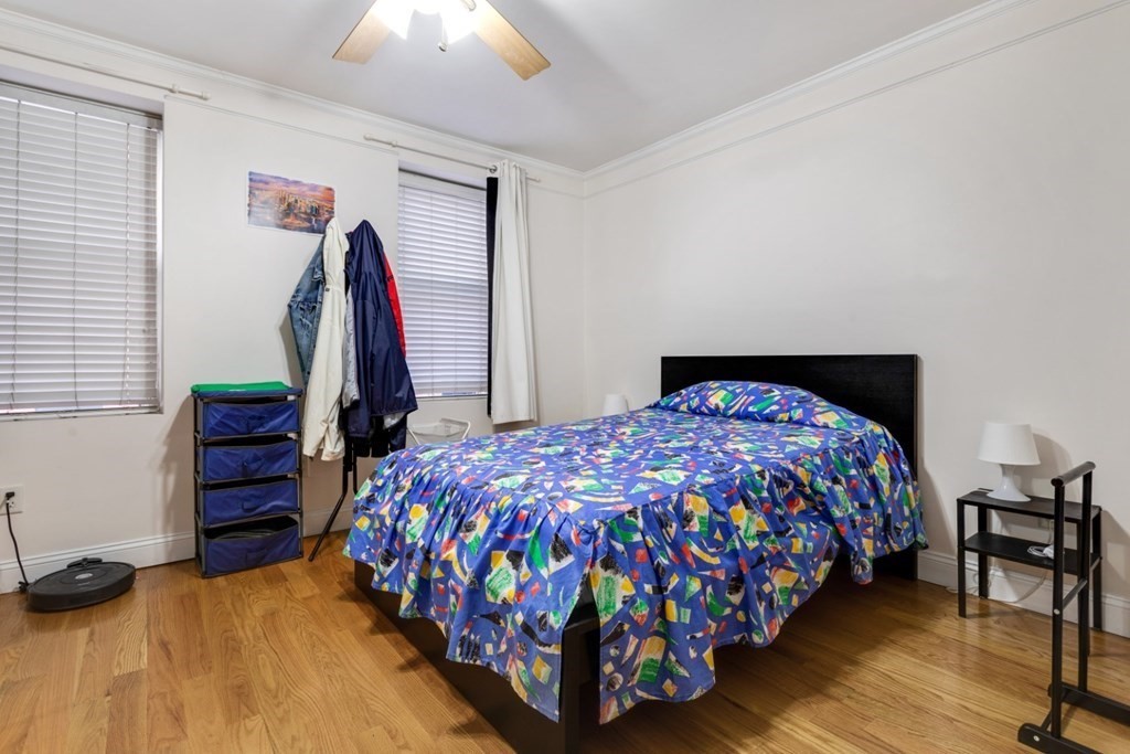 72 North Margin Street Boston, MA 02113 - Photo 36 of 42 a bedroom with a bed and a closet