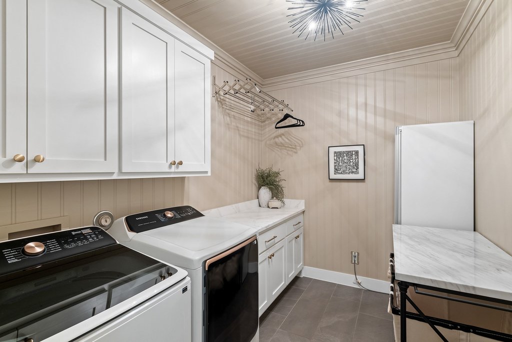 2324 High Lonesome Leander, TX 78641 - Photo 35 of 40 The laundry room is as stylish as it is functional.
