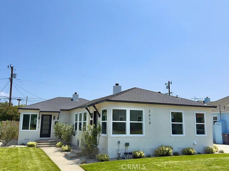 2510 Termino Avenue, Unit B Long Beach, CA 90815 - Photo 1 of 22 a front view of a house with a yard