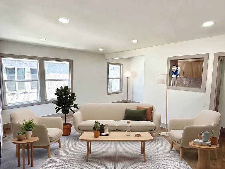 2510 Termino Avenue, Unit B Long Beach, CA 90815 - Photo 11 of 22 a living room with furniture and a large window