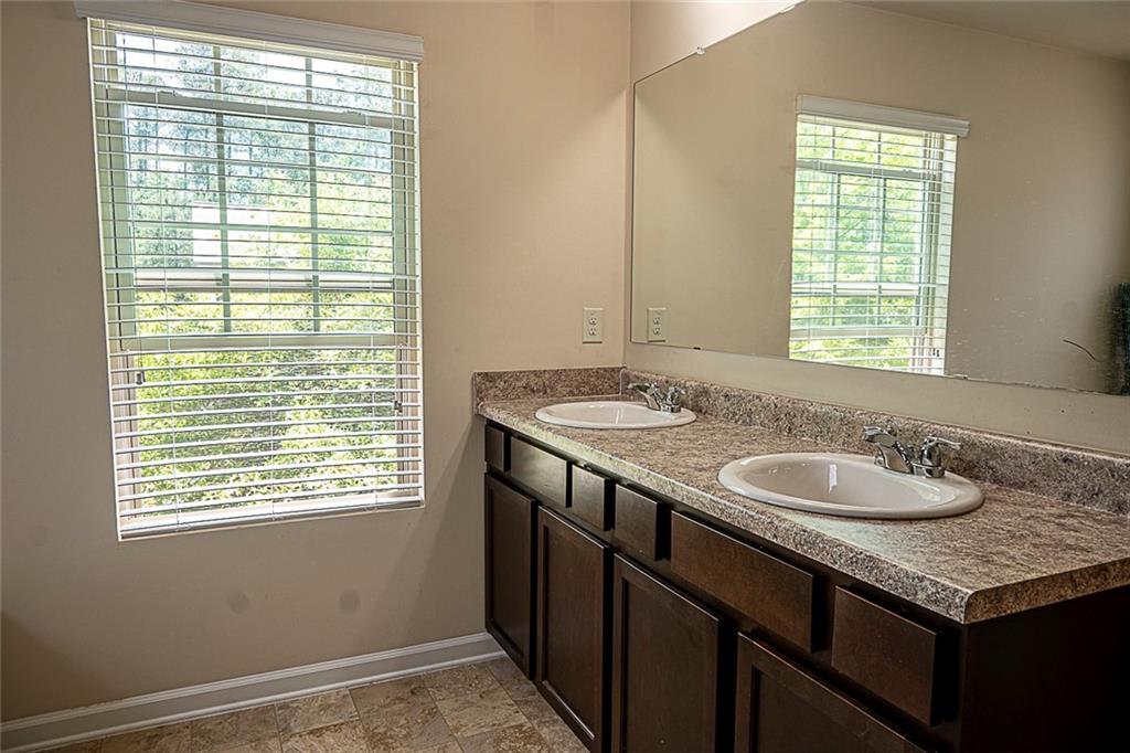 3922 Makeover Court Atlanta, GA 30349 - Photo 33 of 38