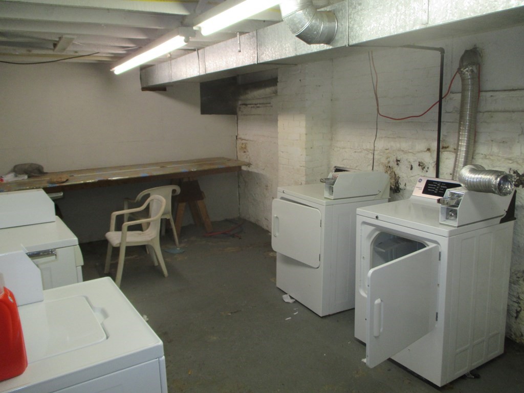 97 Holly Street Springfield, MA 01151 - Photo 12 of 13 a utility room with dryer and washer