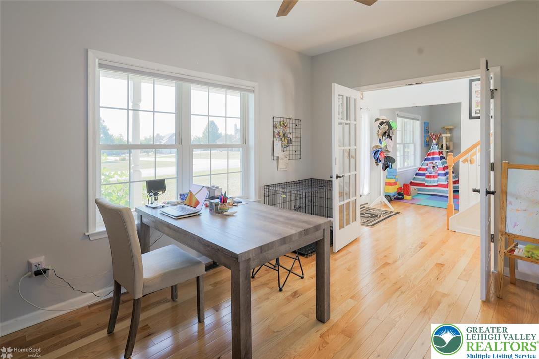 2168 Terry Road Nazareth, PA 18064 - Photo 17 of 81 a view of a dining room with furniture and wooden floor
