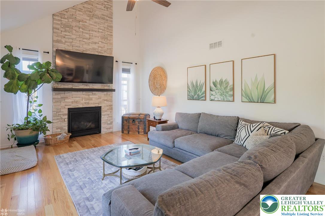 2168 Terry Road Nazareth, PA 18064 - Photo 27 of 81 a living room with furniture and a fireplace