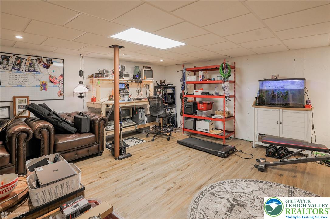 2168 Terry Road Nazareth, PA 18064 - Photo 60 of 81 a room with gym equipment and a flat screen tv