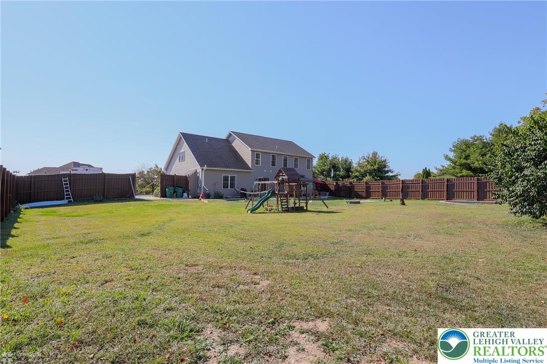 2168 Terry Road Nazareth, PA 18064 - Photo 65 of 81 a front view of house with yard and trees in the background