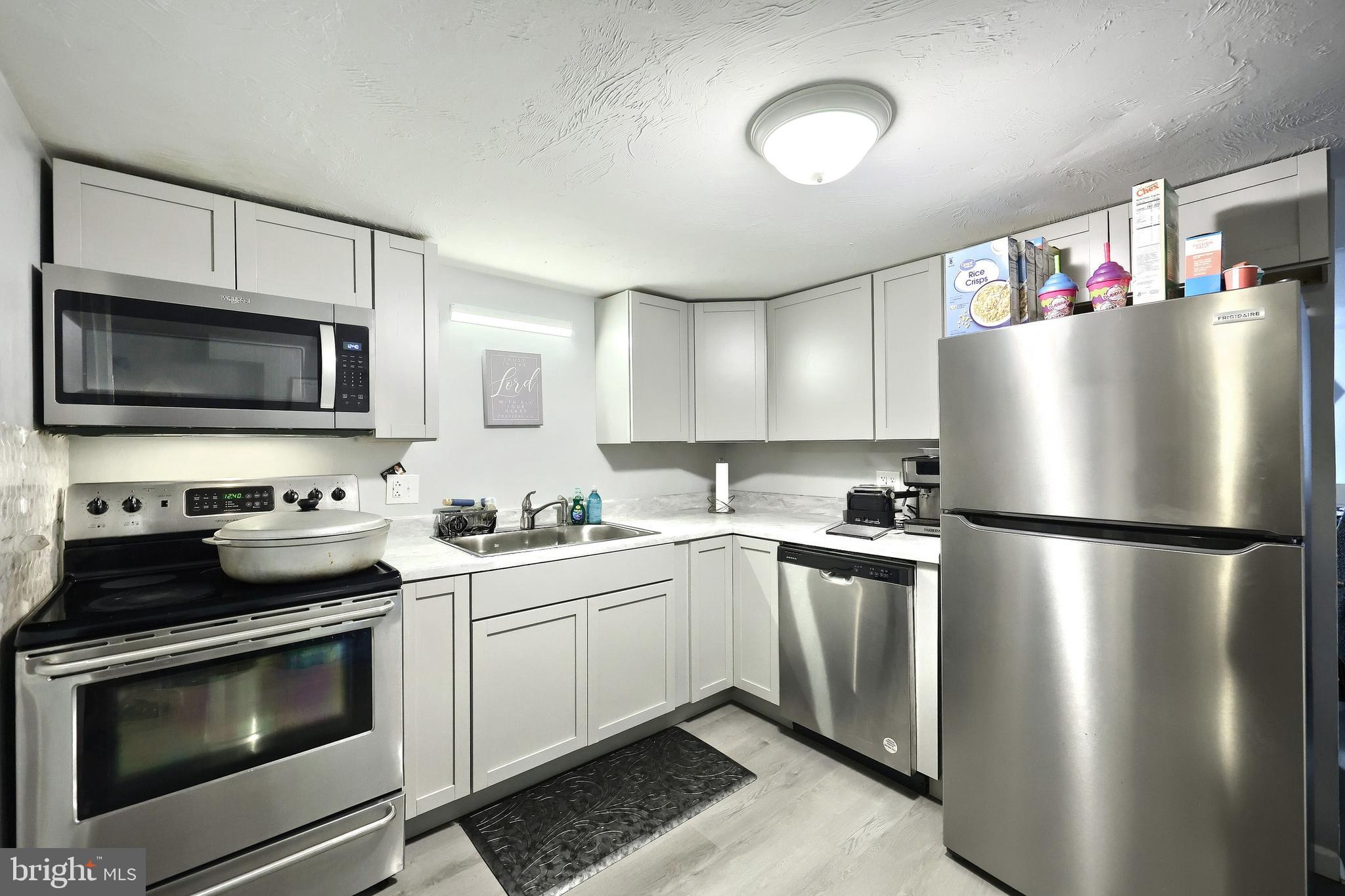 18 Beck Mill Road Hanover, PA 17331 - Photo 12 of 20 a kitchen with stainless steel appliances a refrigerator stove top oven and sink
