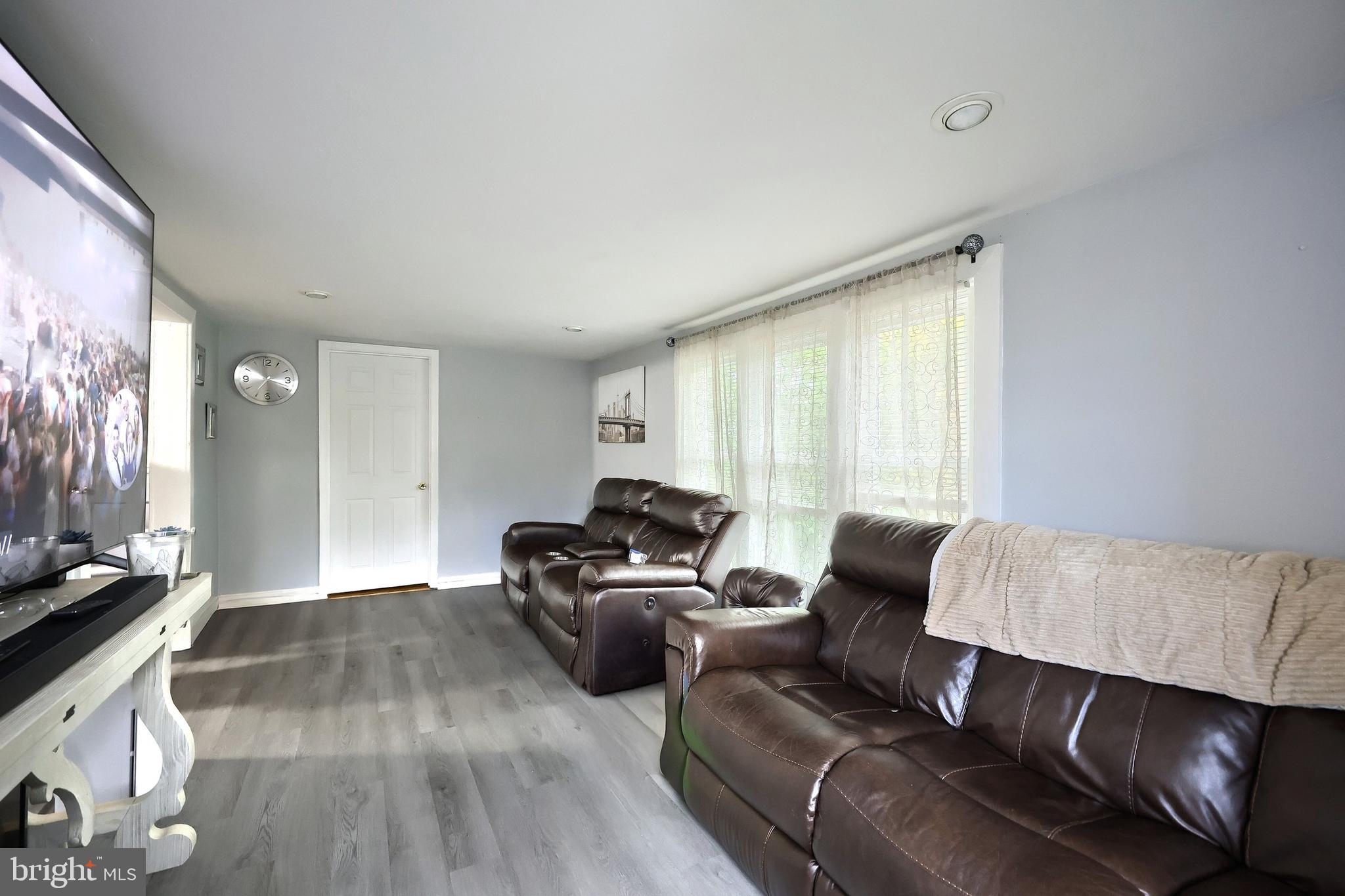 18 Beck Mill Road Hanover, PA 17331 - Photo 9 of 20 a living room with furniture and a flat screen tv
