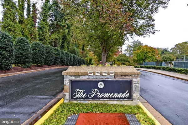 a view of sign board with a park