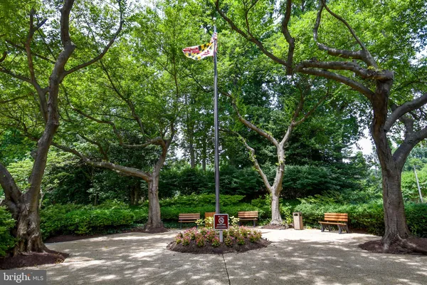 a front view of a building with garden