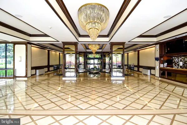 a swimming pool with indoor seating